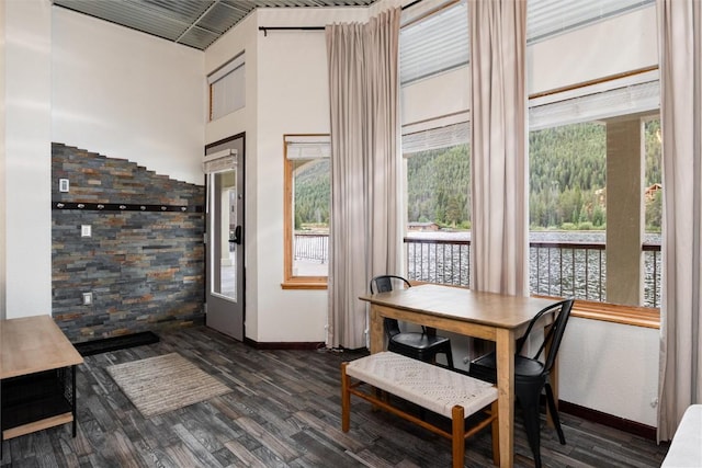 22174 US Highway 6 Unit 7, Keystone, CO 80435 - dining area with dark wood finished floors and a high ceiling