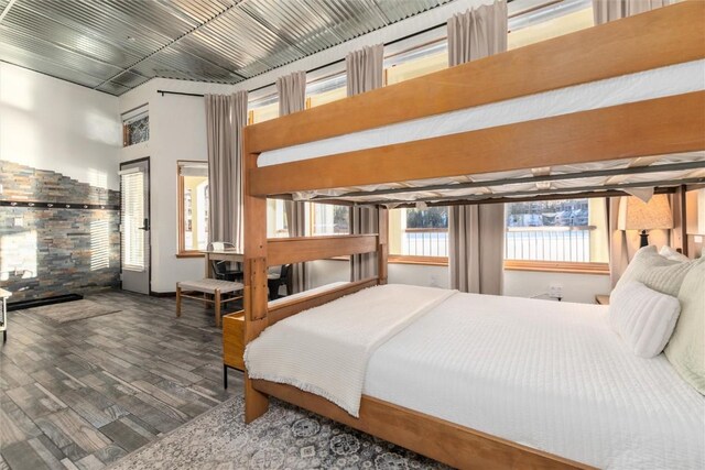 22174 US Highway 6 Unit 7, Keystone, CO 80435 - bedroom with wood finished floors and a high ceiling