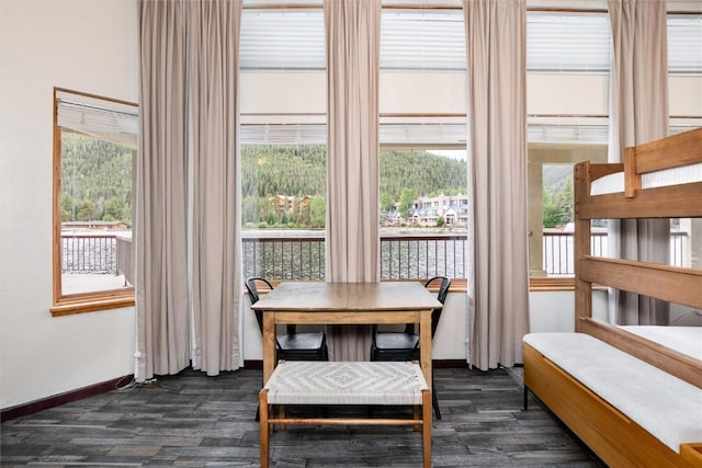 22174 US Highway 6 Unit 7, Keystone, CO 80435 - dining space with dark wood-style flooring and a water view