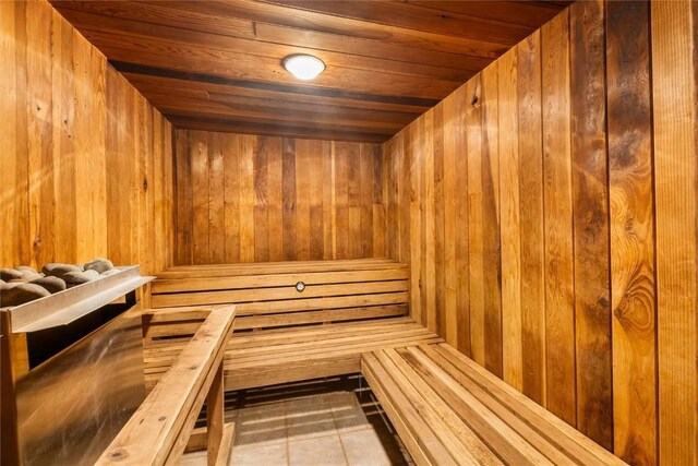 22174 US Highway 6 Unit 7, Keystone, CO 80435 - sauna featuring wood walls, wood ceiling, and tile patterned floors