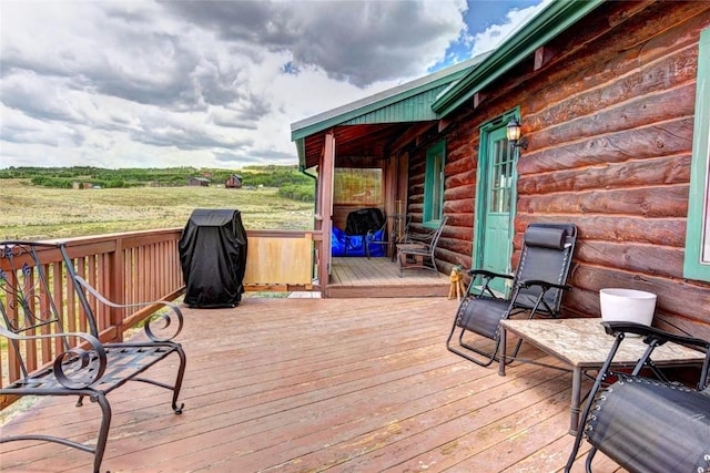 262 Swandyke Ct, Jefferson, CO 80456 - wooden terrace with a grill