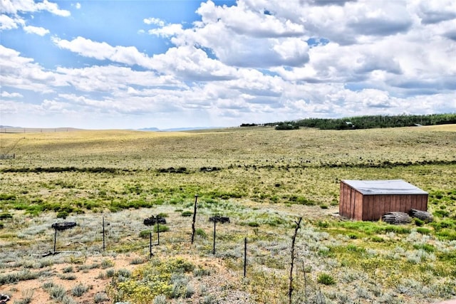 262 Swandyke Ct, Jefferson, CO 80456 - view of yard featuring a view of rural / pastoral area and an outbuilding