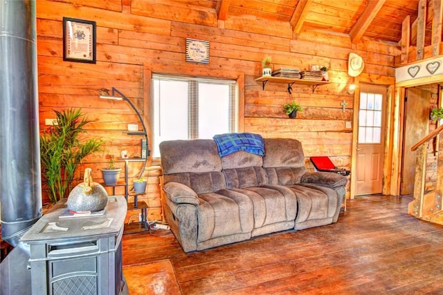 262 Swandyke Ct, Jefferson, CO 80456 - living room featuring a wood stove, wood ceiling, hardwood / wood-style flooring, and wooden walls
