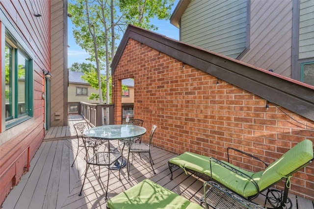 2650 Medicine Springs Dr Unit 11, Steamboat Springs, CO 80487 - wooden terrace featuring outdoor dining area