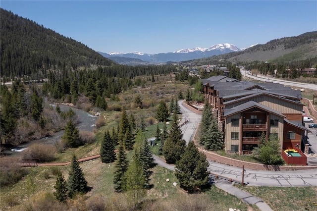 22714 US Highway 6 Unit 5958, Keystone, CO 80435 - aerial view of property and surrounding area featuring mountains and a forest