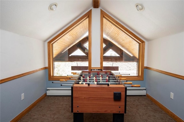 22714 US Highway 6 Unit 5958, Keystone, CO 80435 - rec room featuring a baseboard heating unit, healthy amount of natural light, and dark carpet