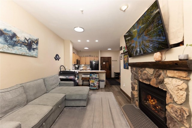 22714 US Highway 6 Unit 5958, Keystone, CO 80435 - living room with wood finished floors, a fireplace, and recessed lighting