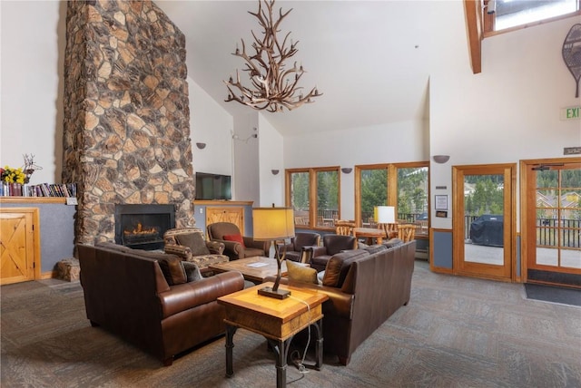 22714 US Highway 6 Unit 5958, Keystone, CO 80435 - living area with high vaulted ceiling, a chandelier, a stone fireplace, and carpet floors