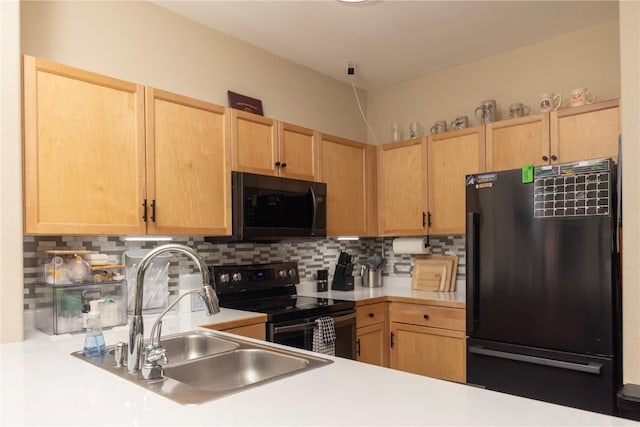 22714 US Highway 6 Unit 5958, Keystone, CO 80435 - kitchen with black appliances, a sink, light countertops, and backsplash