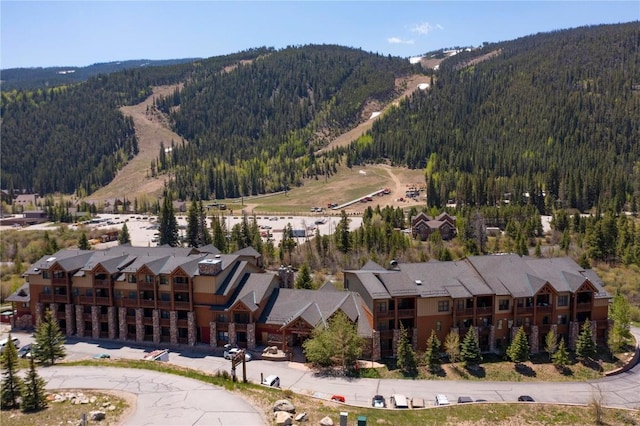 22714 US Highway 6 Unit 5958, Keystone, CO 80435 - aerial view of a forest and a mountainous background