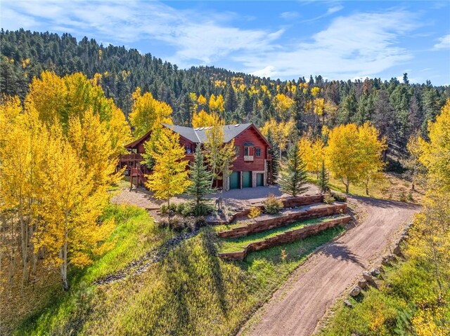 bird's eye view featuring a view of trees