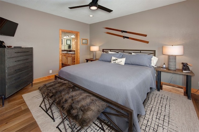 164 Buck Ridge Rd Unit 164, Summit Cove, CO 80435 - bedroom featuring wood finished floors, recessed lighting, connected bathroom, and ceiling fan