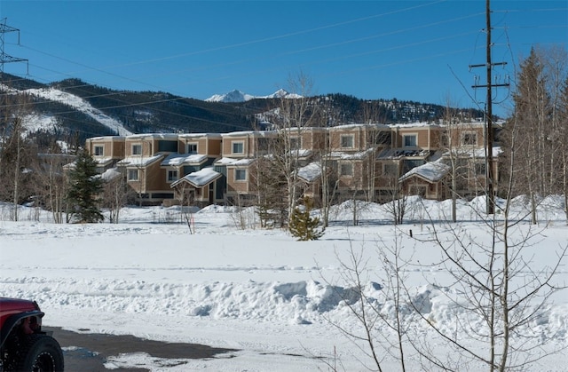 164 Buck Ridge Rd Unit 164, Summit Cove, CO 80435 - view of mountain background featuring nearby suburban area
