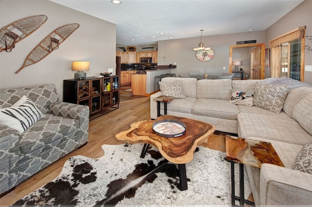 164 Buck Ridge Rd Unit 164, Summit Cove, CO 80435 - living room featuring light wood-style flooring and recessed lighting