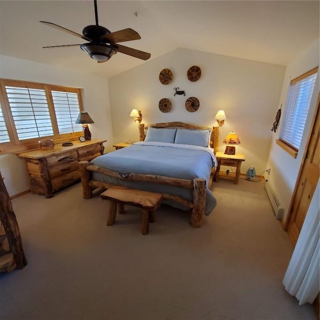 91399 Ryan Gulch Rd Unit B3, Silverthorne, CO 80498 - bedroom with a baseboard radiator, multiple windows, lofted ceiling, carpet, and a ceiling fan