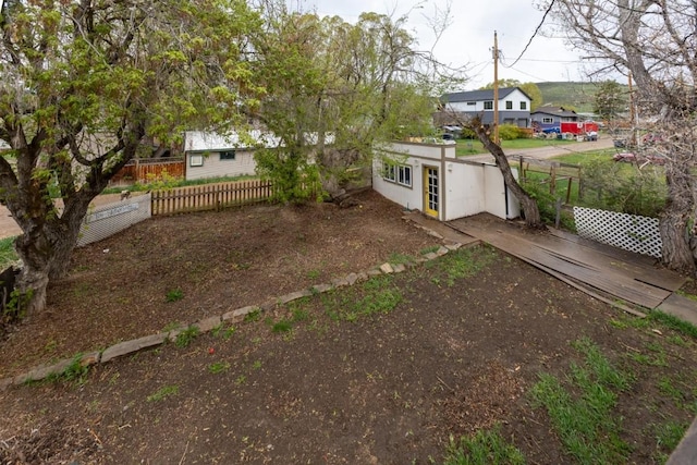 21490 2nd Ave, Milner, CO 80487 - fenced yard with a deck and an outdoor structure