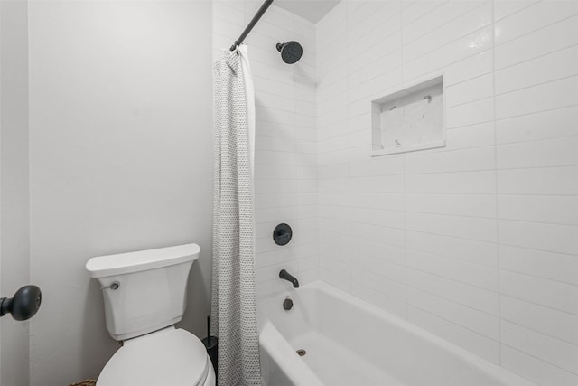 6941 Ryan Gulch Rd Unit 6941, Silverthorne, CO 80498 - bathroom featuring shower / tub combo with curtain and toilet