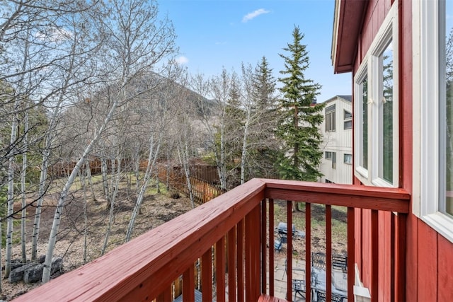 wooden terrace with a mountain view