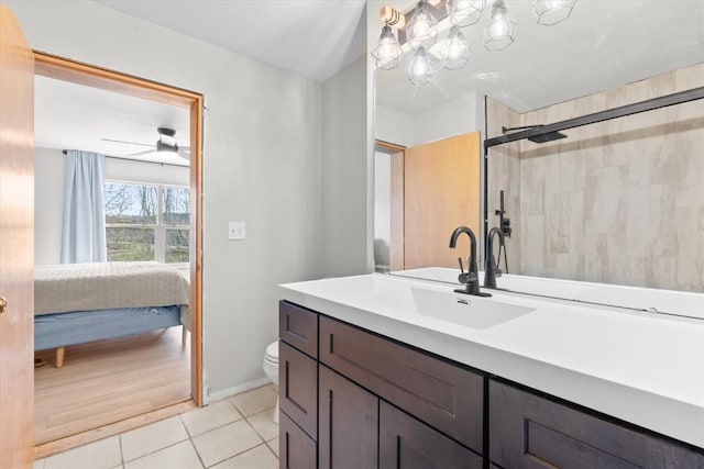 57680 Saturn Ct, Clark, CO 80428 - bathroom with tile patterned floors, ensuite bath, an enclosed shower, toilet, and vanity