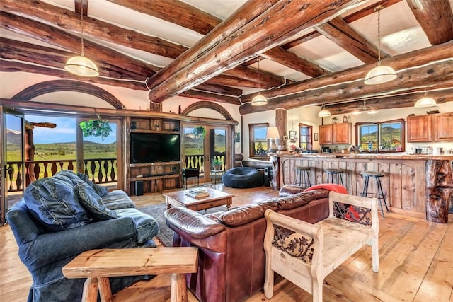 61020 County Road 129, Hahns Peak, CO 80428 - living room featuring light wood-style flooring and beam ceiling
