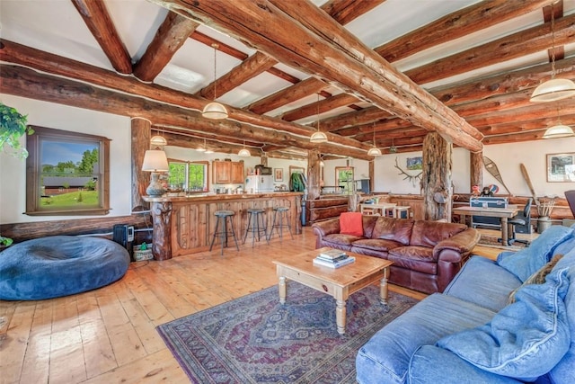 61020 County Road 129, Hahns Peak, CO 80428 - living area with hardwood / wood-style flooring and beamed ceiling