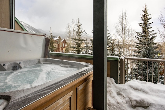 310 S 8th Ave Unit 4, Frisco, CO 80443 - snow covered deck featuring a hot tub