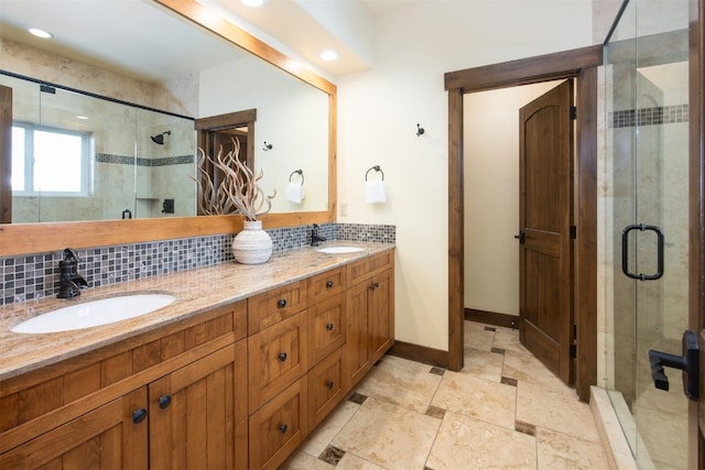 310 S 8th Ave Unit 4, Frisco, CO 80443 - full bathroom with backsplash, double vanity, a stall shower, and a sink