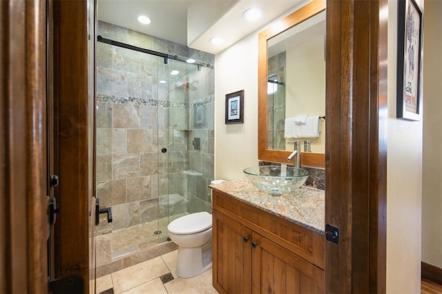 310 S 8th Ave Unit 4, Frisco, CO 80443 - bathroom with a shower stall, tile patterned floors, vanity, toilet, and recessed lighting