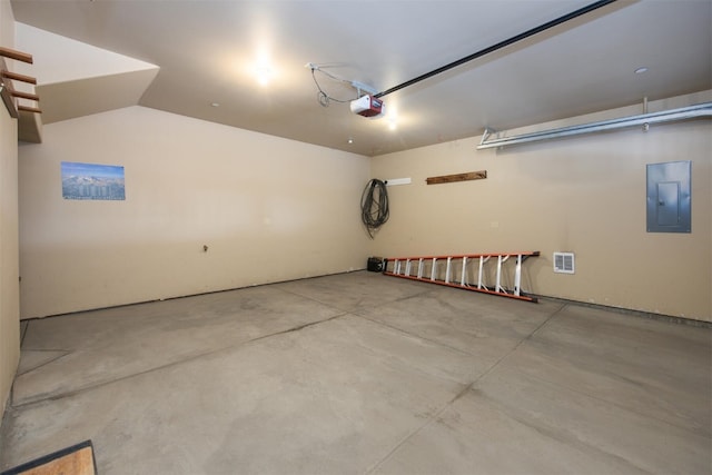310 S 8th Ave Unit 4, Frisco, CO 80443 - garage featuring a garage door opener and electric panel