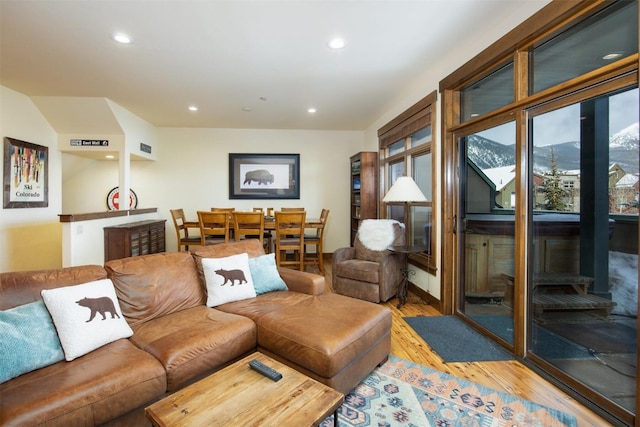 310 S 8th Ave Unit 4, Frisco, CO 80443 - living area featuring light wood finished floors, a wealth of natural light, and recessed lighting