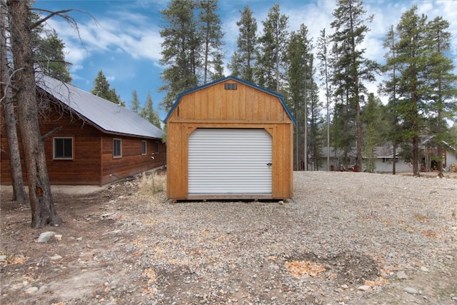 garage with a storage shed