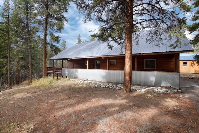 back of property with metal roof