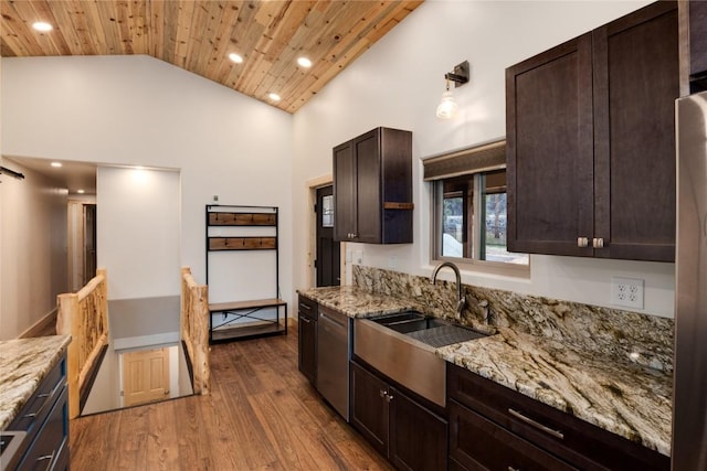 kitchen with dark brown cabinets, a sink, wooden ceiling, dark wood-style flooring, and light stone countertops