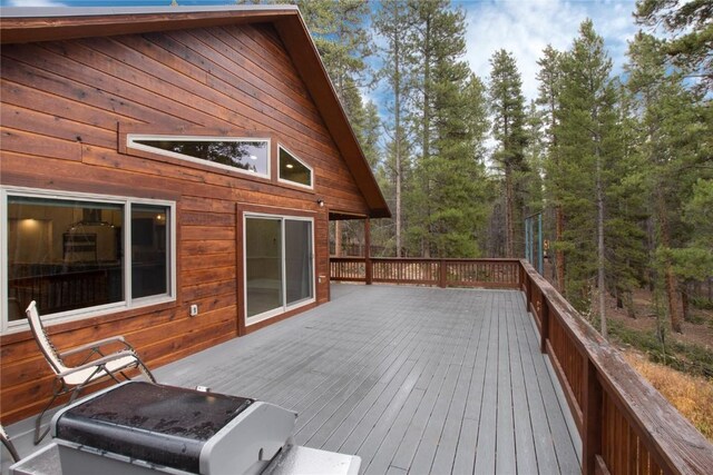 wooden terrace with grilling area