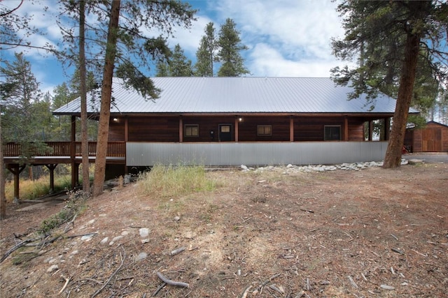 exterior space with metal roof