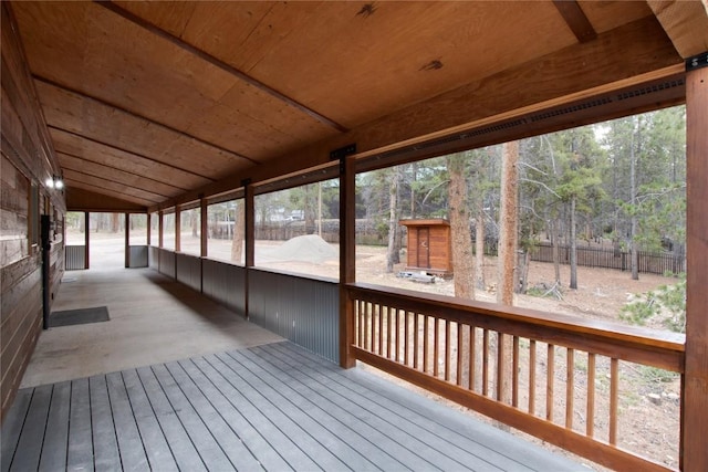 wooden terrace featuring fence
