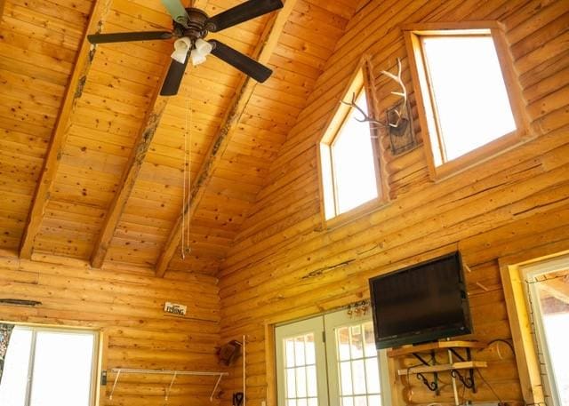 80 Sapling Ln, Craig, CO 81625 - detailed view of a wooden ceiling with exposed beams, a ceiling fan, and rustic walls
