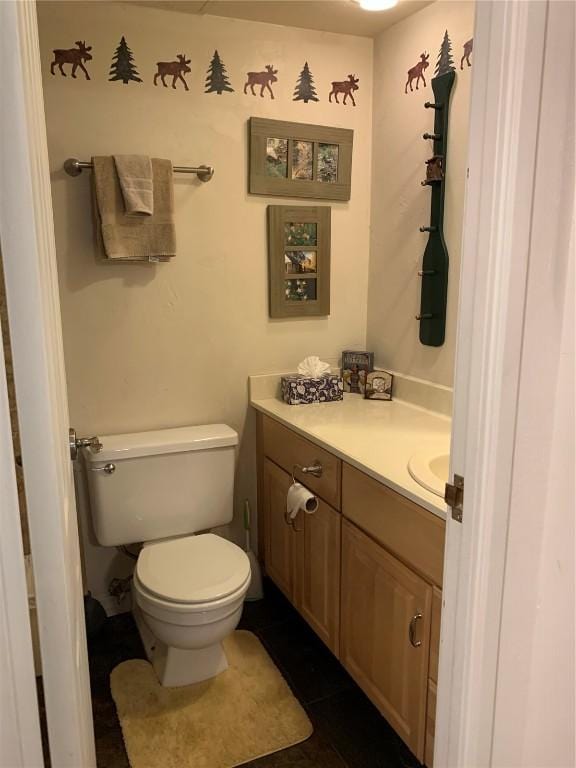 222 Creekside Dr Unit 112, Frisco, CO 80443 - bathroom featuring tile patterned flooring, vanity, and toilet