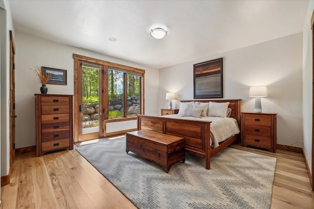 240 Two Cabins Dr, Silverthorne, CO 80498 - bedroom featuring light wood-style flooring and access to outside