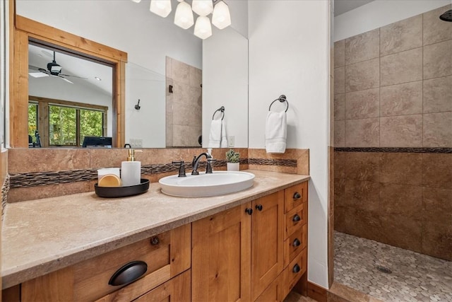 240 Two Cabins Dr, Silverthorne, CO 80498 - full bathroom featuring lofted ceiling, walk in shower, vanity, and ceiling fan
