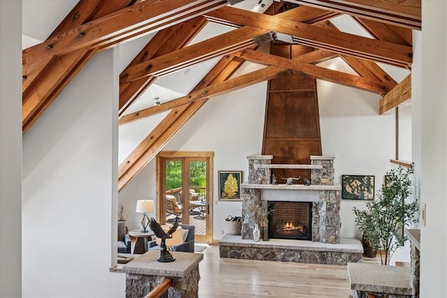 240 Two Cabins Dr, Silverthorne, CO 80498 - living room with wood finished floors, a fireplace, and lofted ceiling
