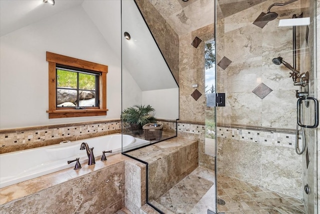 240 Two Cabins Dr, Silverthorne, CO 80498 - bathroom featuring a bath, vaulted ceiling, and a stall shower