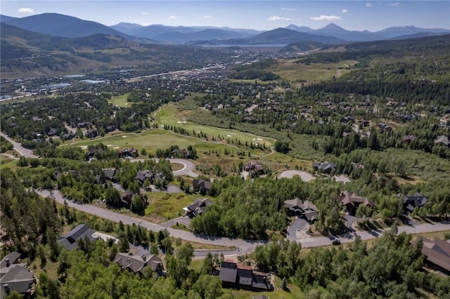 240 Two Cabins Dr, Silverthorne, CO 80498 - aerial view of property and surrounding area with a mountainous background, nearby suburban area, and a local golf course