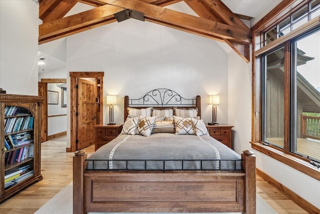 240 Two Cabins Dr, Silverthorne, CO 80498 - bedroom featuring wood finished floors, beamed ceiling, and high vaulted ceiling