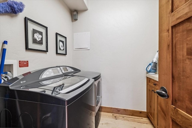 240 Two Cabins Dr, Silverthorne, CO 80498 - laundry area with independent washer and dryer and light wood-style floors