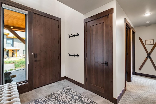 18 Lena Way, Silverthorne, CO 80498 - entrance foyer with baseboards and radiator heating unit