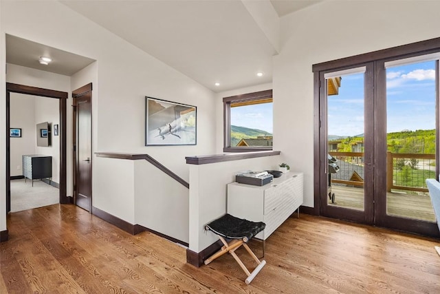 18 Lena Way, Silverthorne, CO 80498 - hall with baseboards, wood finished floors, recessed lighting, and vaulted ceiling