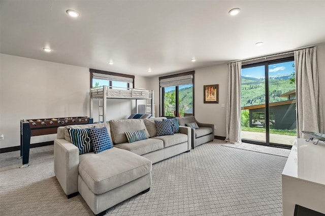 18 Lena Way, Silverthorne, CO 80498 - living room with light colored carpet, baseboards, and recessed lighting