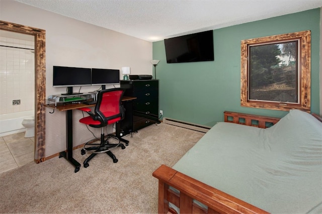 carpeted home office featuring baseboards, a textured ceiling, and a baseboard radiator
