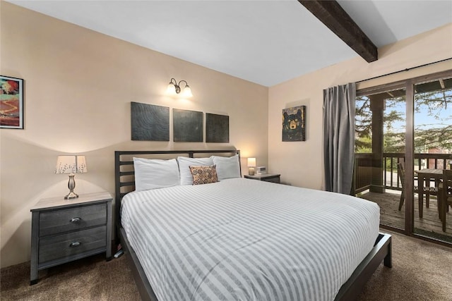 2470 Apres Ski Way Unit 103, Steamboat Springs, CO 80487 - bedroom with dark carpet, access to exterior, and beam ceiling
